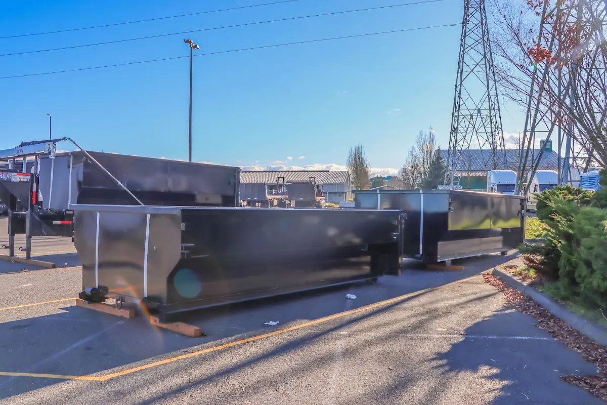 Roll-off dumpster ready for waste disposal at job site for 2 Yard Dumpster Rental in Ashtabula